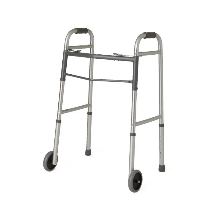 NIB! Guardian Two-Button Folding Walker with 5" Wheels, Perfect for recovery and everyday safety, this folding walker comes equipped with hand grips and non-marking tires.