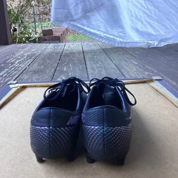 Nike black mercurial soccer athletic cleats, size 7